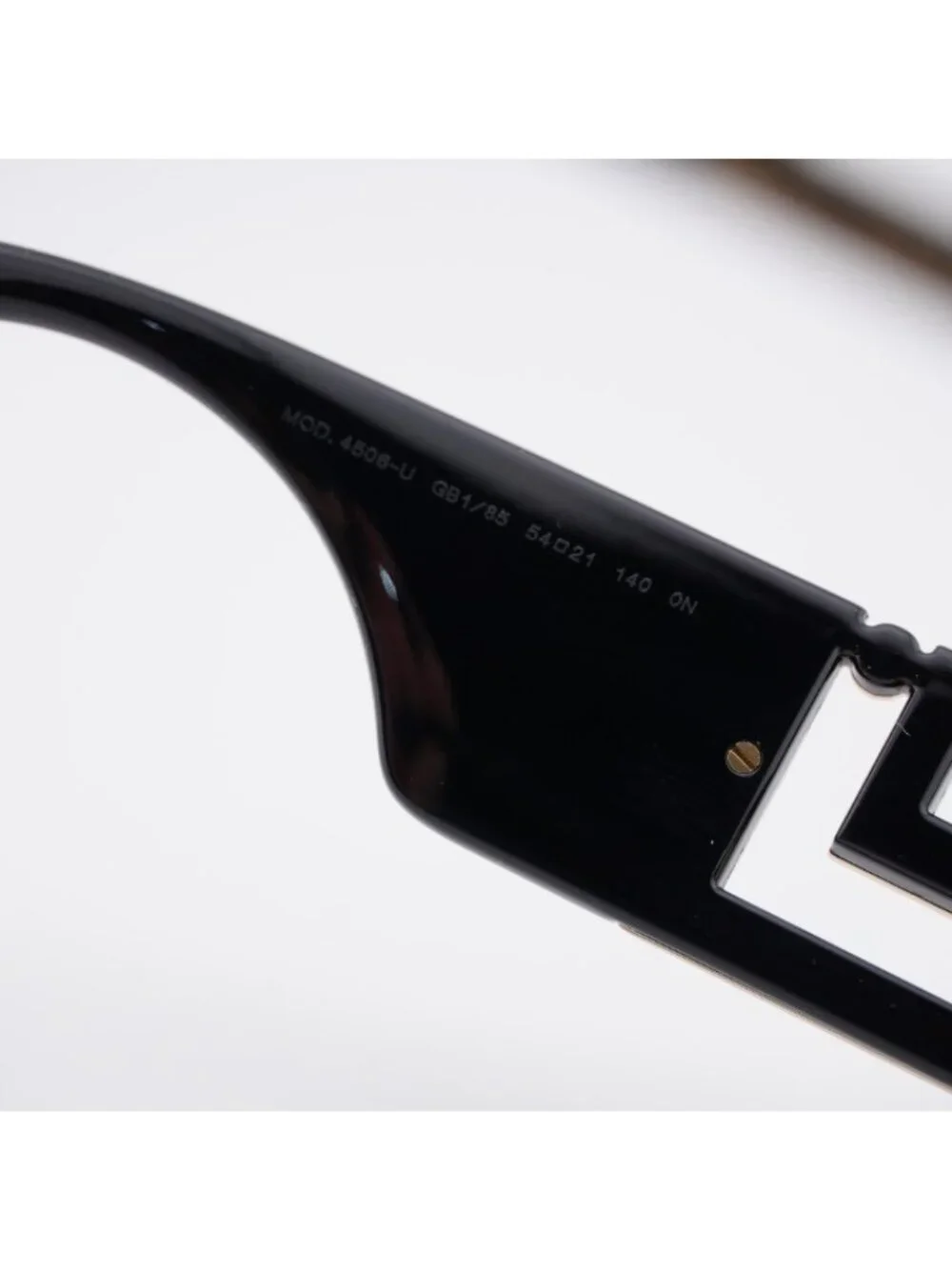 Versace VE4506U GB1/85 Sunglasses Black Rectangle Frame, Yellow Lenses